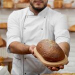 young-man-working-at-his-bakery-26MRPG5-768x512