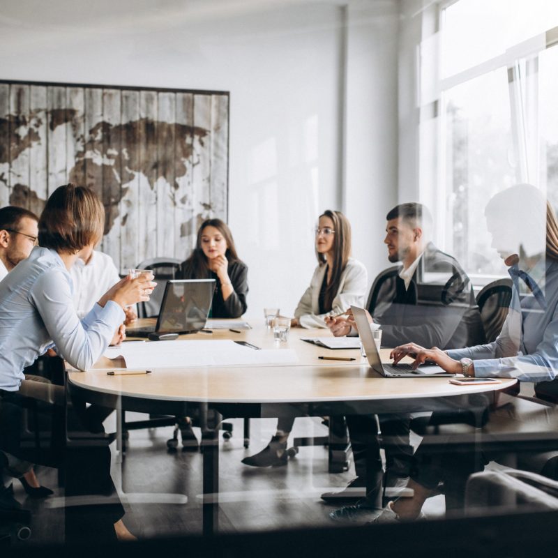 group-people-working-out-business-plan-office